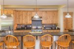 Kitchen with Stainless Steal Appliances & Bar Seating for 6
